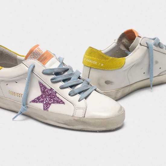 Women Golden Goose superstar sneakers with pink glittery star and yellow